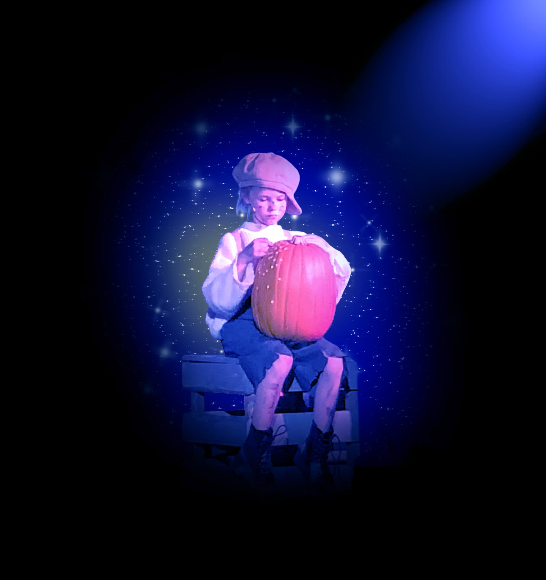 The Pumpkin Kid sits on a wooden crate holding a glowing pumpkin against a deep blue starfield